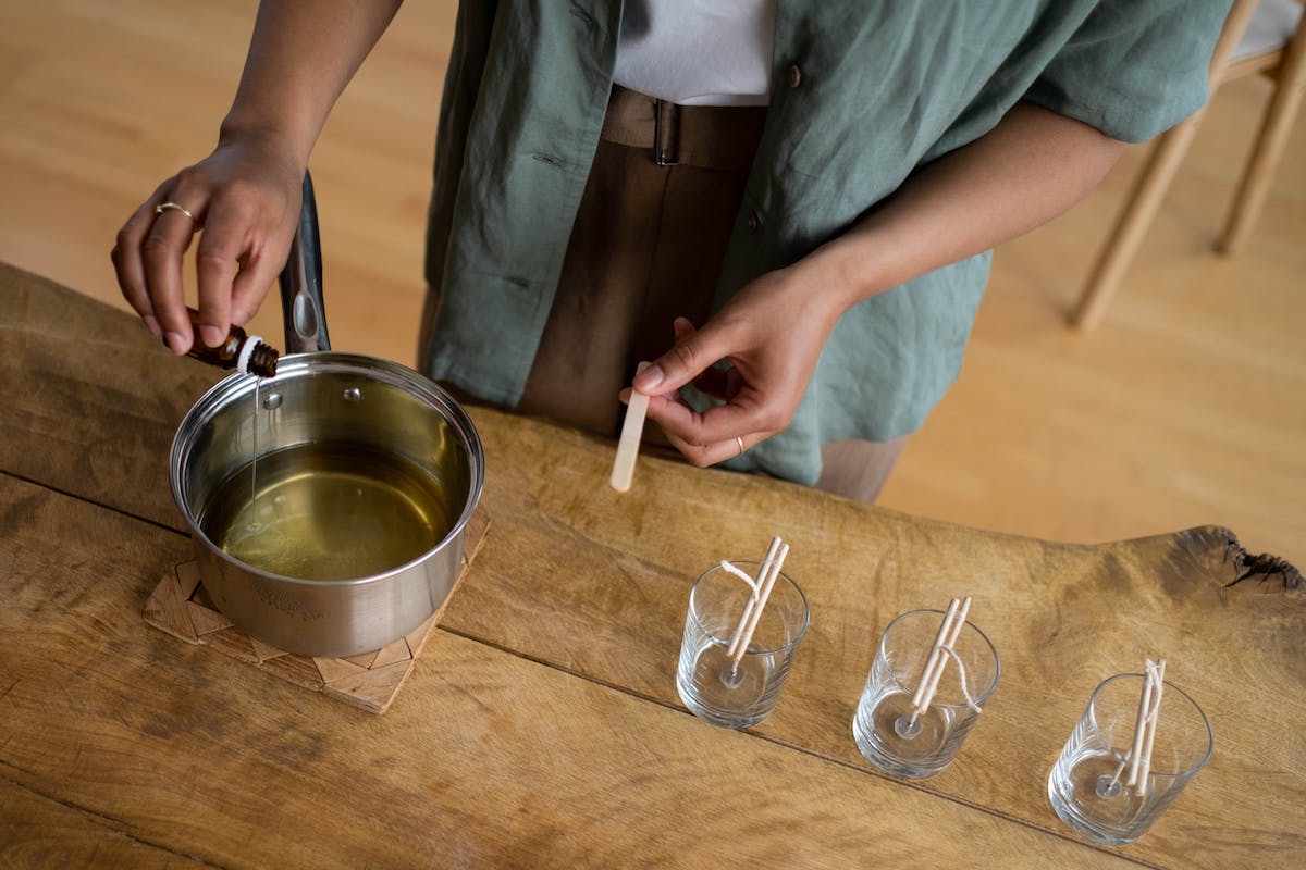 fragrance oil poured into soy wax to make refillable candles